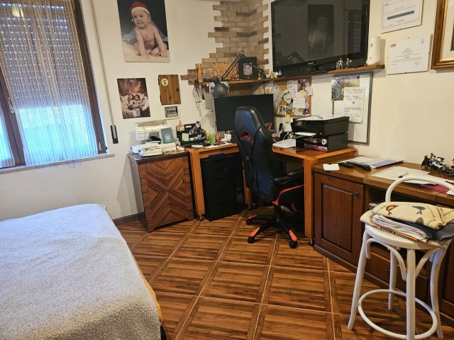 PORZIONE DI BIFAMILIARE